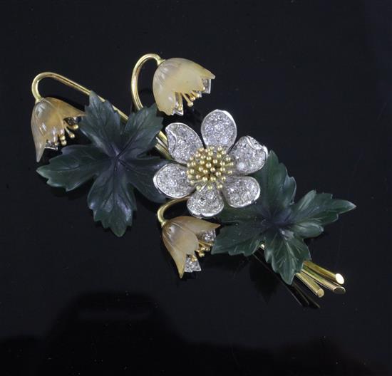 A 1960s white and yellow gold, jadeite and diamond set floral spray brooch, 65mm.